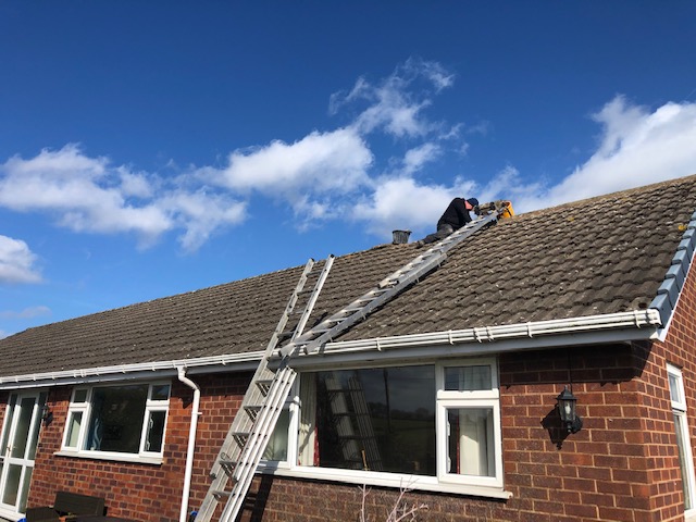 Ridge tiles removed and refitted and pointed over two days