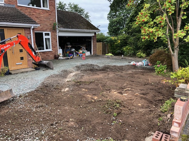 Driveway extension. Cobbled the entrance and 20 ton of stone covering driveway.